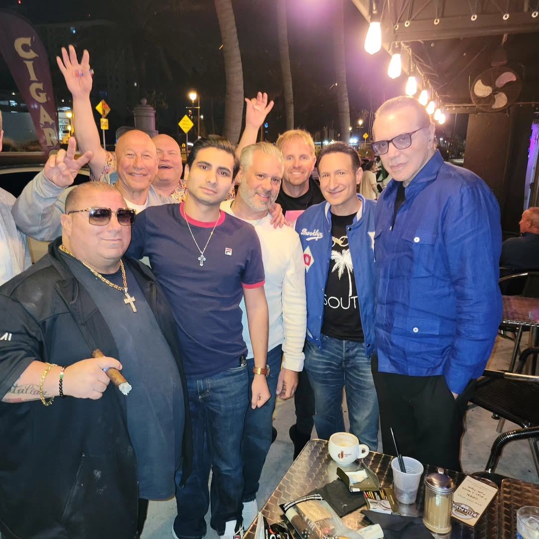 The crew out front on a warm night